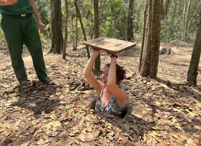 A person performing an acrobatic flip in a forest. 5