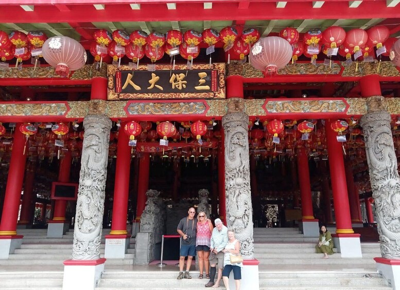 A traditional Chinese building with red lanterns and intricate carvings. 3