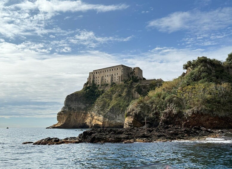 A coastal castle perched on a cliff overlooking the sea. 5