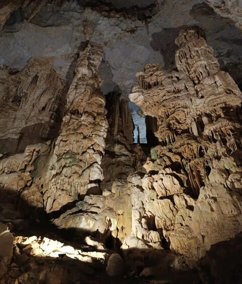 A cave with stalactites and stalagmites. 1