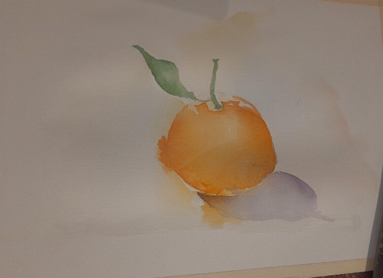 A watercolor painting of an orange with a stem and leaves. 5