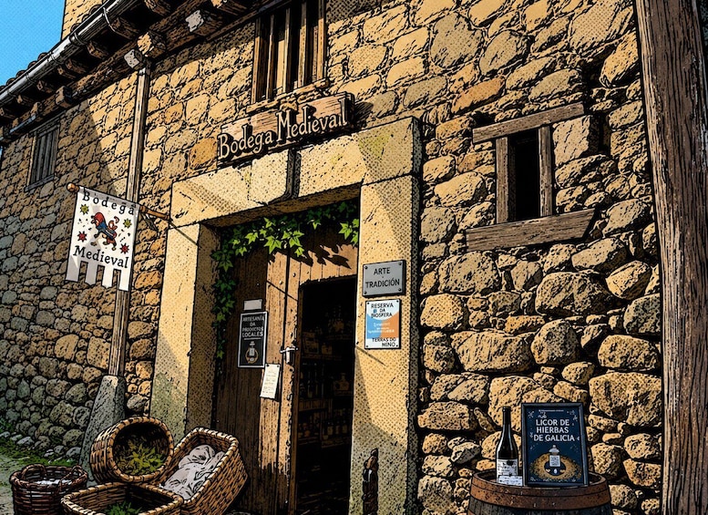 A stone building with a sign reading 'Bodega Medieval.' There are baskets outside and a sign for 'Artesanía de Productos Locales.' 4