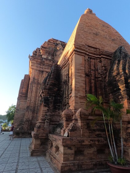 An ancient temple with intricate carvings and a large dome structure. 4