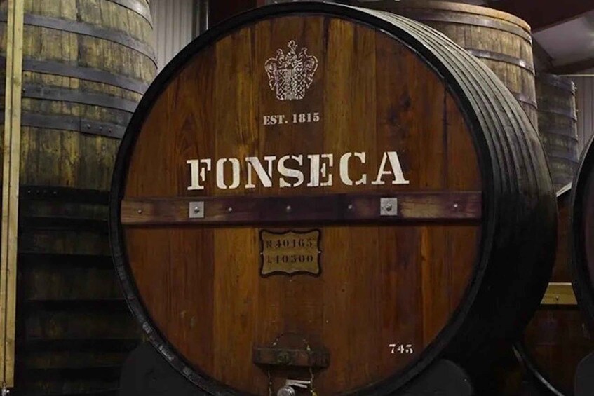 A wooden barrel with the label 'FONSECA' and 'EST. 1815' on it. 5