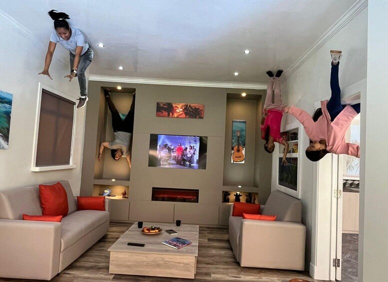 A living room with two sofas, a coffee table, and a TV. 5