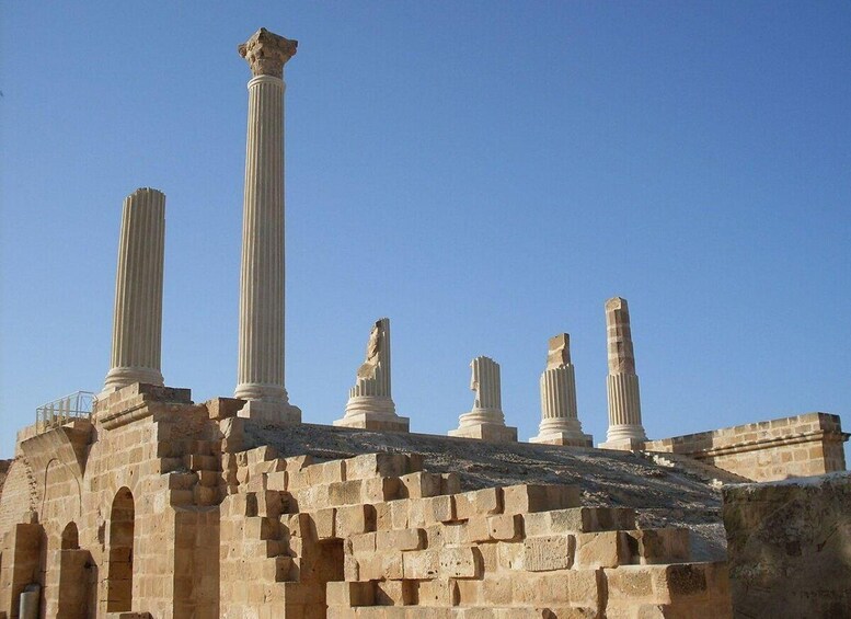Ancient columns and ruins of a historical structure. 5