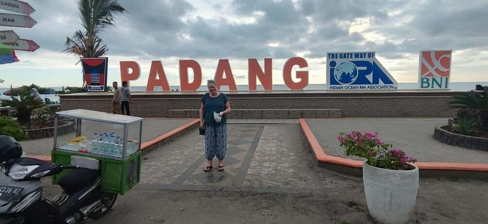 A sign with 'PADANG' and logos of the Indian Ocean Rim Association and BNI. 2