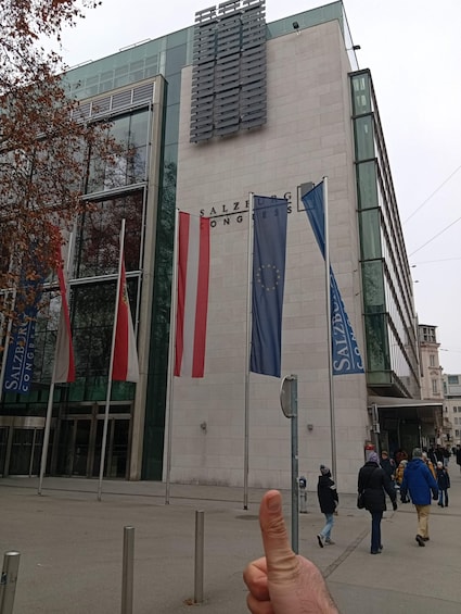 A building with flags, including the EU flag, and the text 'SALZBURG CONGRESS'. 4