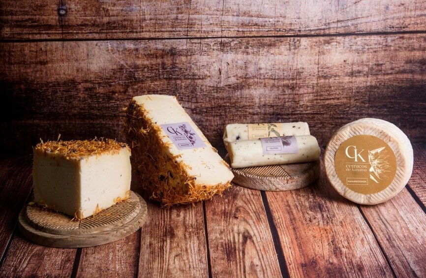 Various cheeses on wooden boards. 1