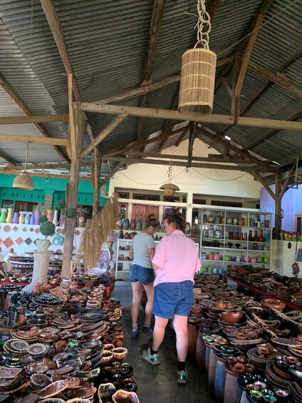 A market stall with pottery and ceramics. 1