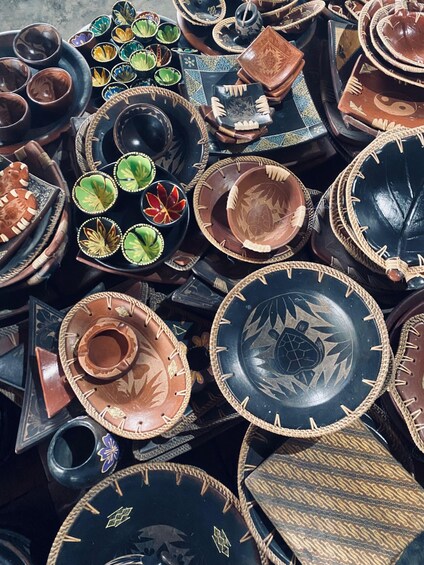 A collection of intricately designed pottery and bowls. 2
