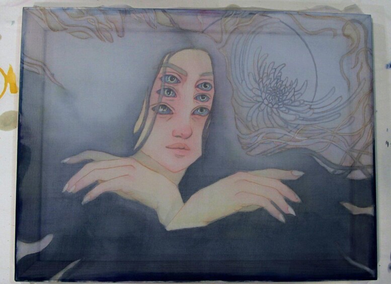 A painting of a person with a blurred face, surrounded by abstract patterns and a large flower-like design. 5