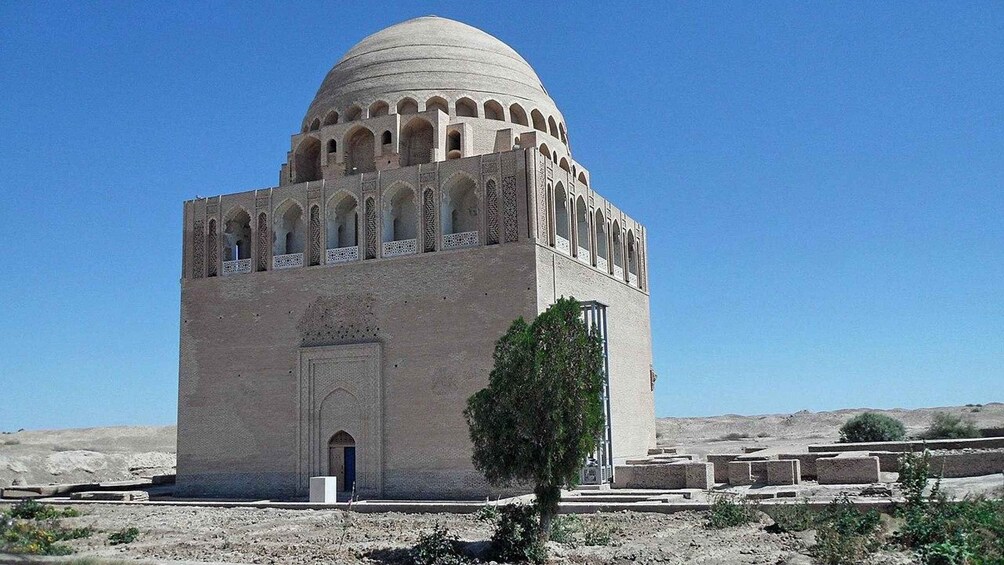 A large, domed building with arched windows and a central entrance. 5