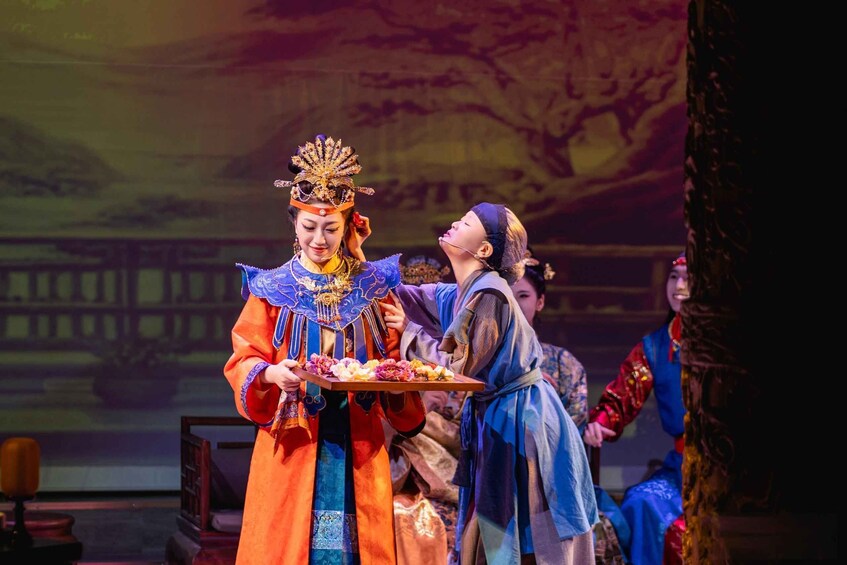 A theatrical performance with actors in traditional costumes. 4