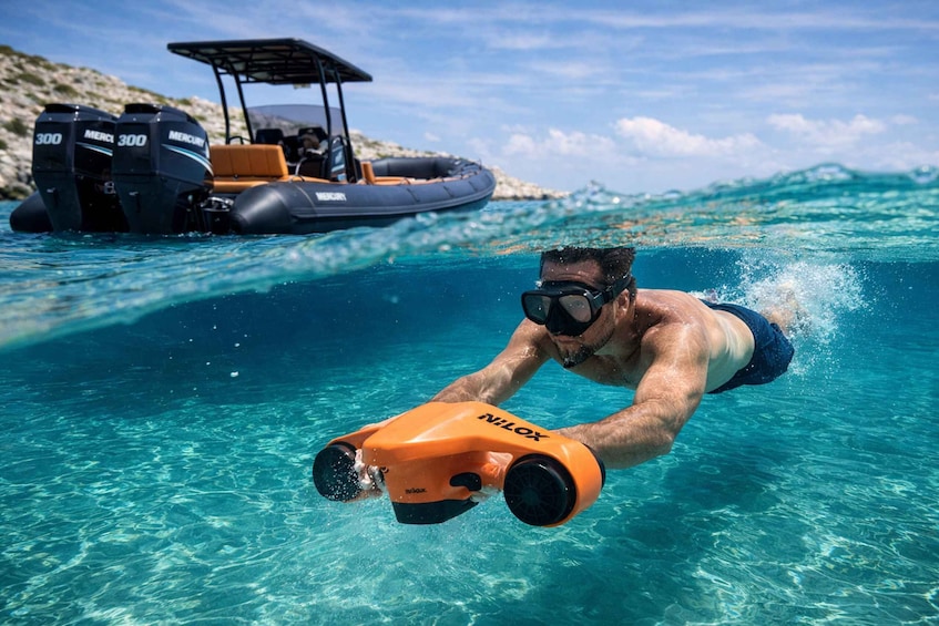 A person swimming underwater with a snorkel and mask, and a boat with a canopy in the background. 1