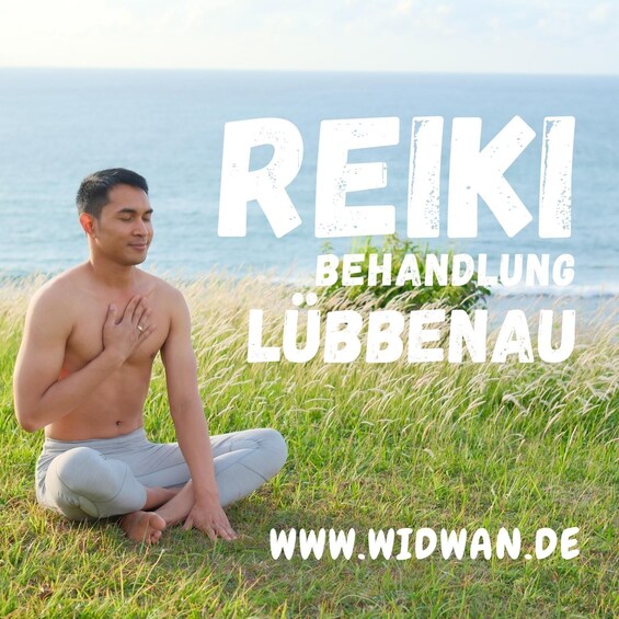 A person sitting cross-legged on grass by the sea, with the text 'REIKI BEHANDLUNG LÜBBENAU' and a website address. 1