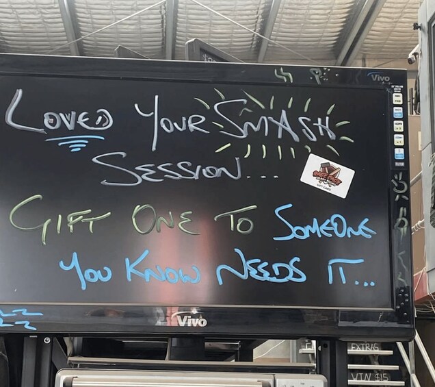 A blackboard with a message about a session and a gift. 5