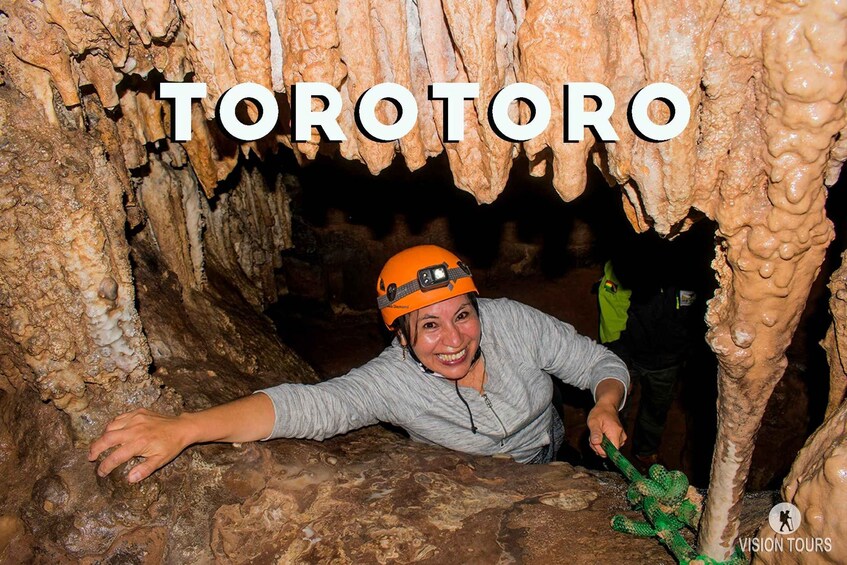 A person inside a cave with the word 'TOROTORO' visible. 5