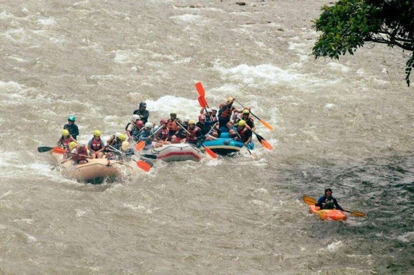 A group of people rafting on a river. 5