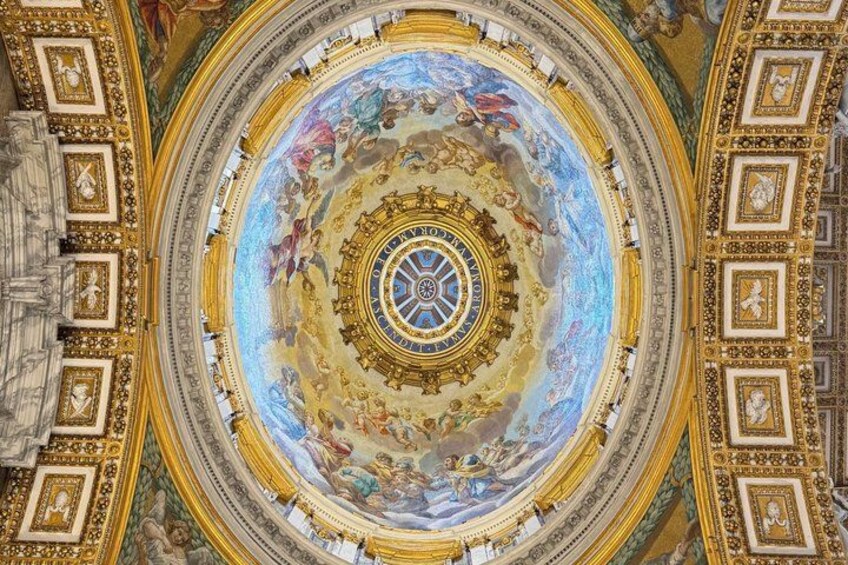 A grand, ornate ceiling with intricate frescoes and gold detailing. 2