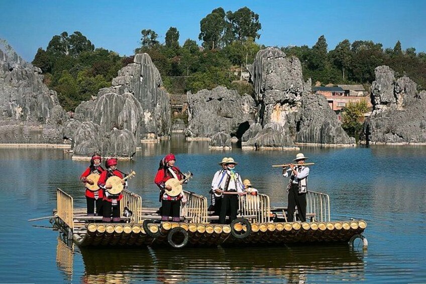 A group of people on a boat playing musical instruments. 5