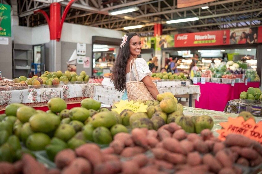 A market with various fruits and vegetables on display. 5
