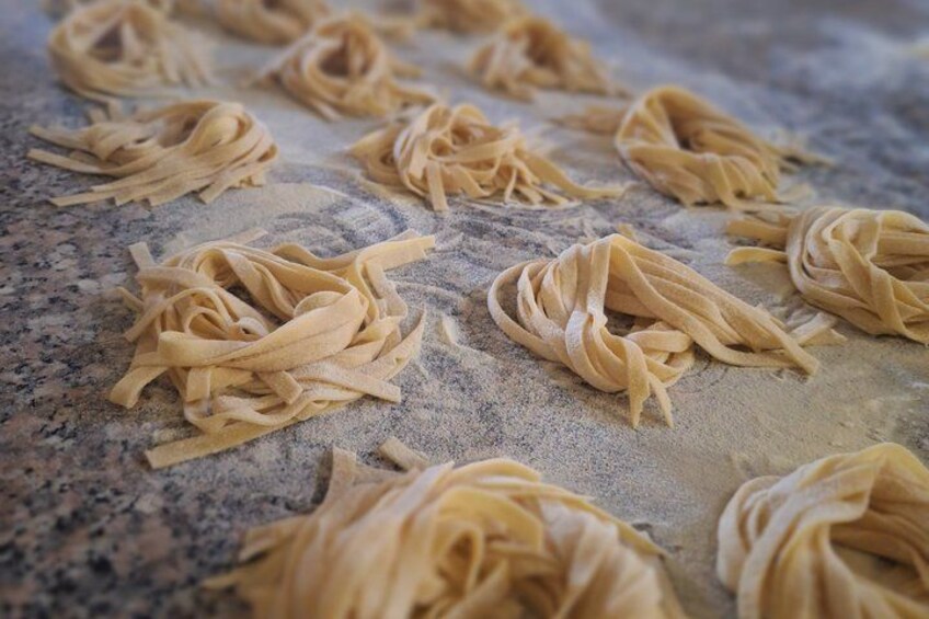 Pasta sheets on a floured surface. 4