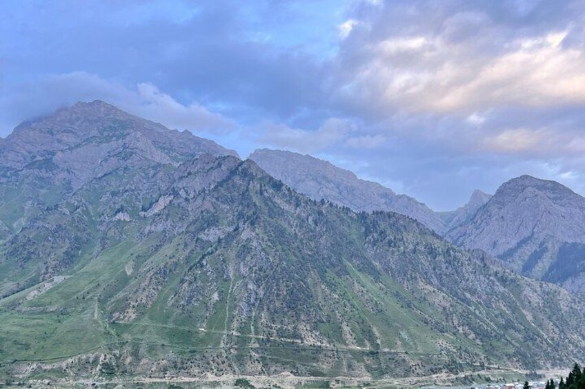 A mountain range with a valley in the foreground. 3