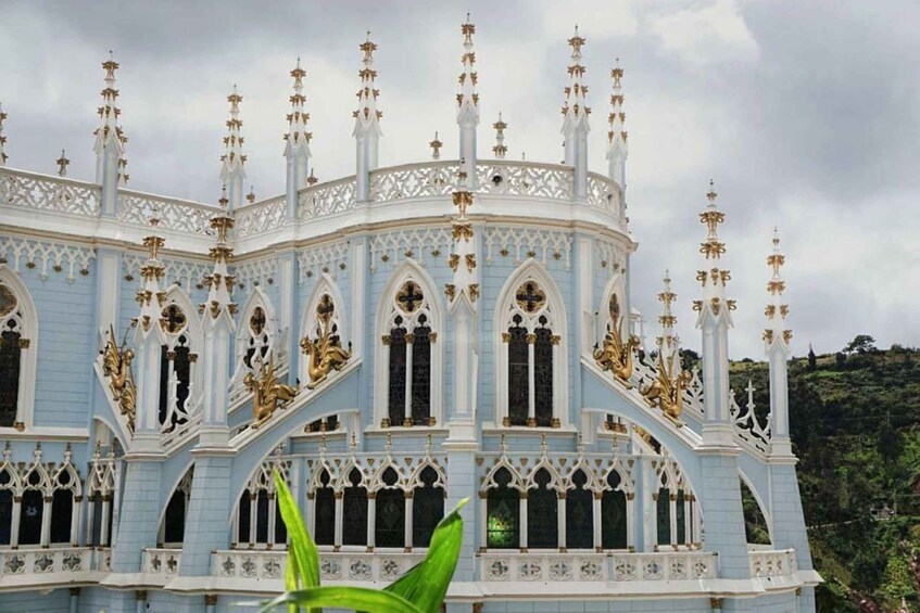 A grand, ornate building with multiple spires and intricate architectural details. 5
