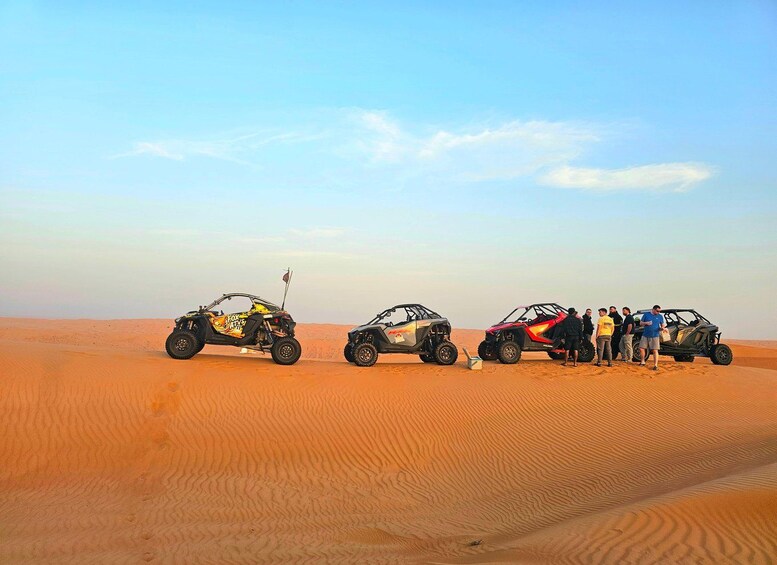 Off-road vehicles on a desert sand dune. 2