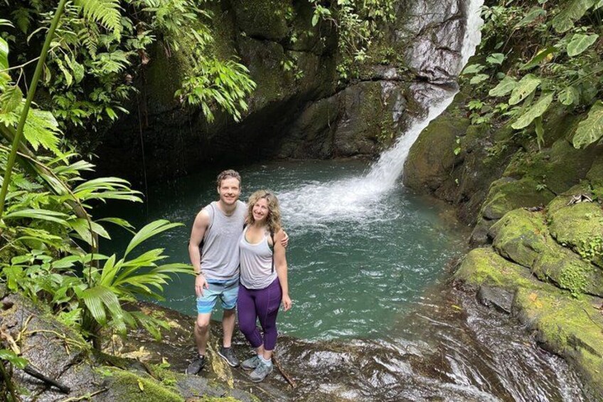 A waterfall, rocky terrain, and lush greenery. 3