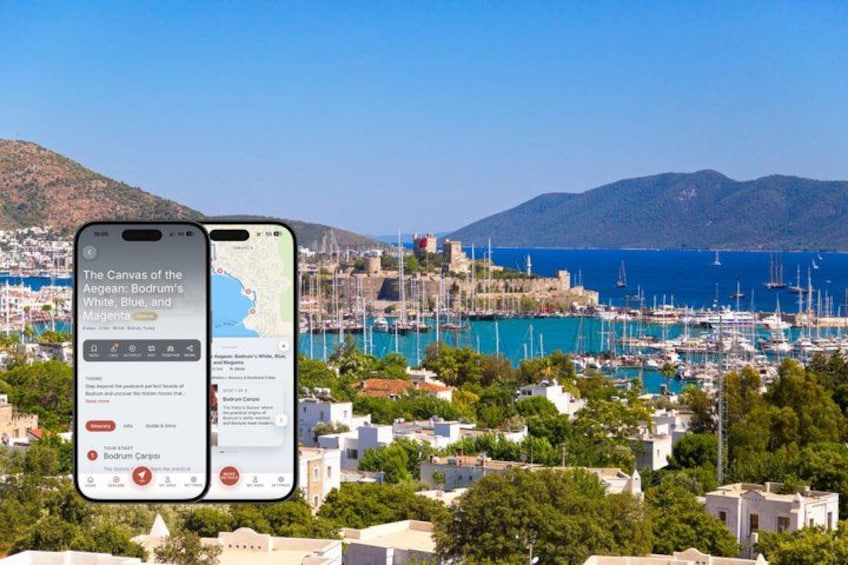 A smartphone displaying a map of a coastal town with a marina, buildings, and hills in the background. 1