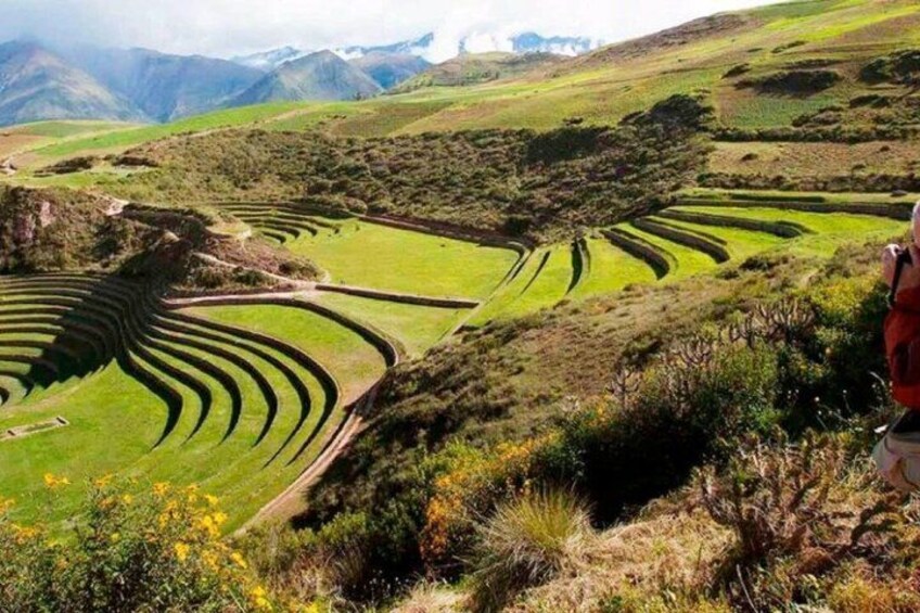 Terraced fields, rolling hills, and distant mountains. 2