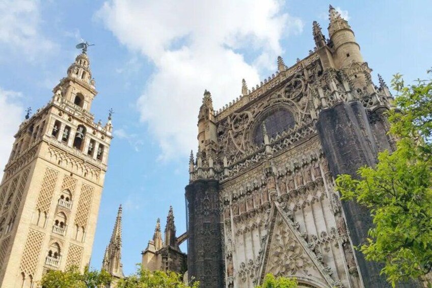 A historic cathedral with intricate Gothic architecture, including pointed arches and detailed stonework. 1