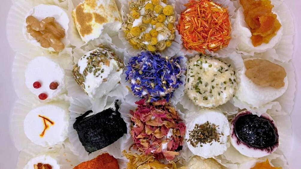 A variety of colorful food items arranged on a tray. 5