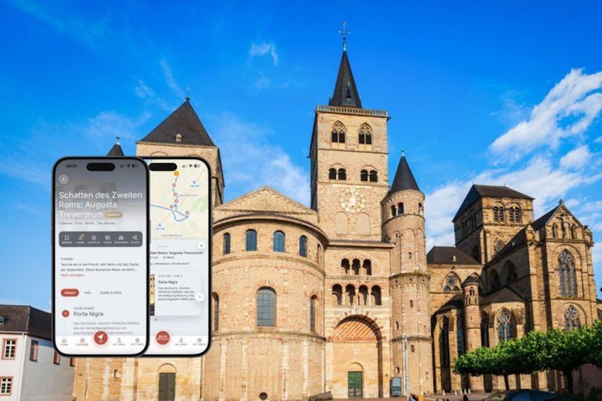 A historic church with a tall bell tower and a smartphone displaying a map. 1