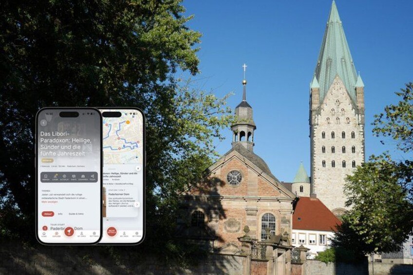 A church with a tall spire and a clock tower. 1