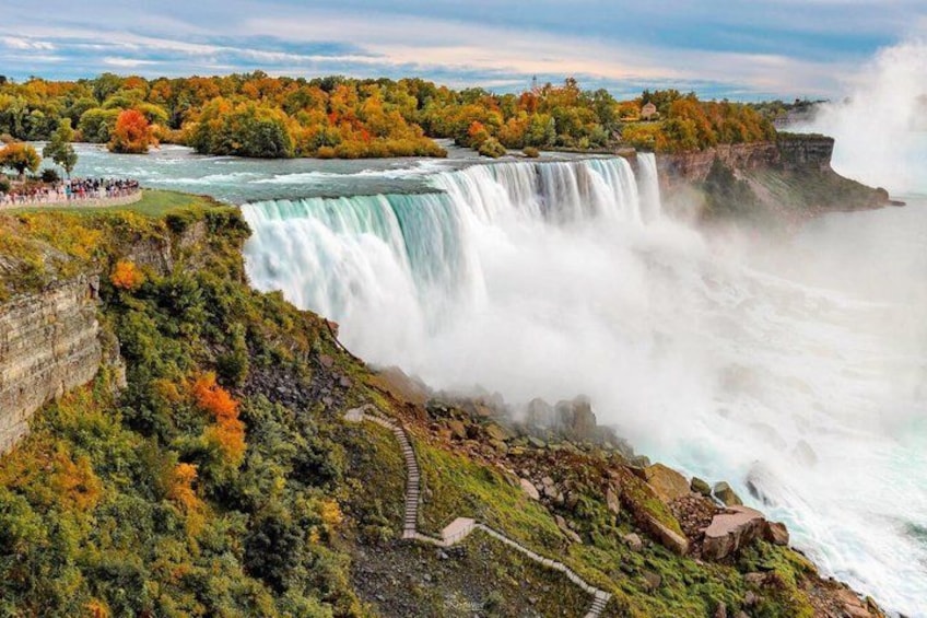 A waterfall, a river, and autumn foliage. 4