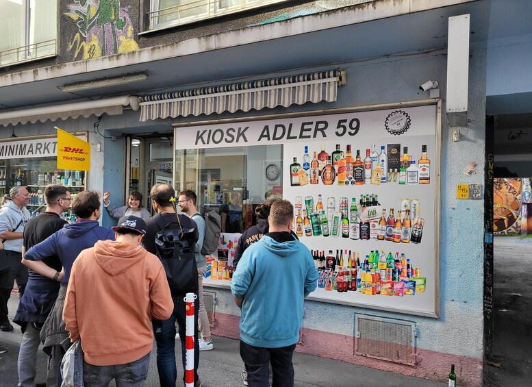 A kiosk named Kiosk Adler 59 with a variety of alcoholic beverages displayed. 1