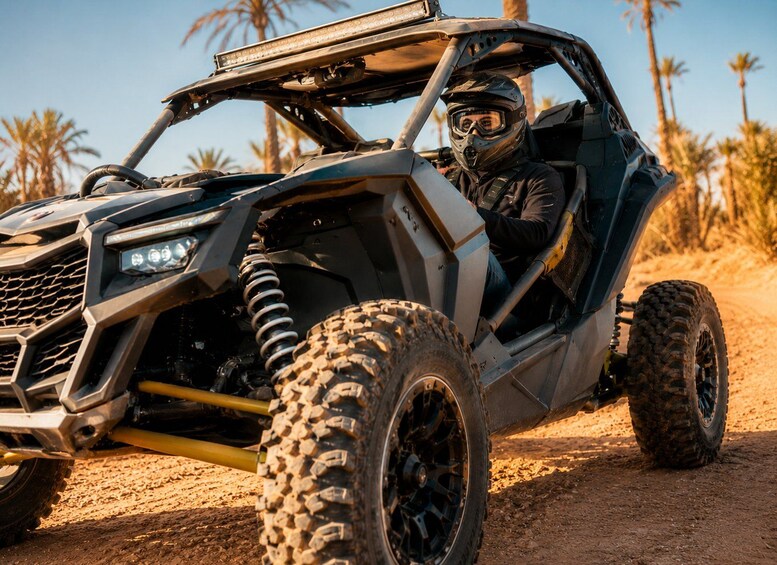 A rugged off-road vehicle on a dirt path with palm trees in the background. 3