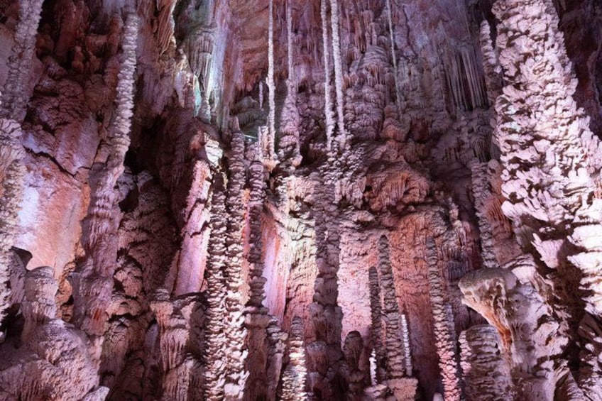 A cave with stalactites and stalagmites. 5