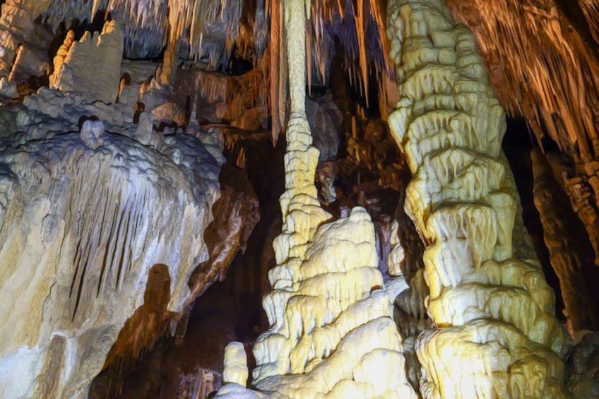 A cave with stalactites and stalagmites. 4