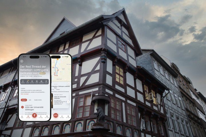 A traditional half-timbered building with a smartphone displaying a map and information about a historical event. 1