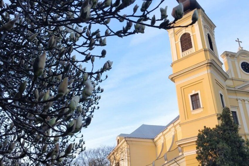 A church with a bell tower and a clear sky. 5