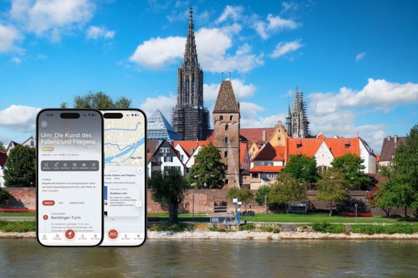A smartphone displaying a map with a view of a town with a prominent church tower and a river in the foreground. 1