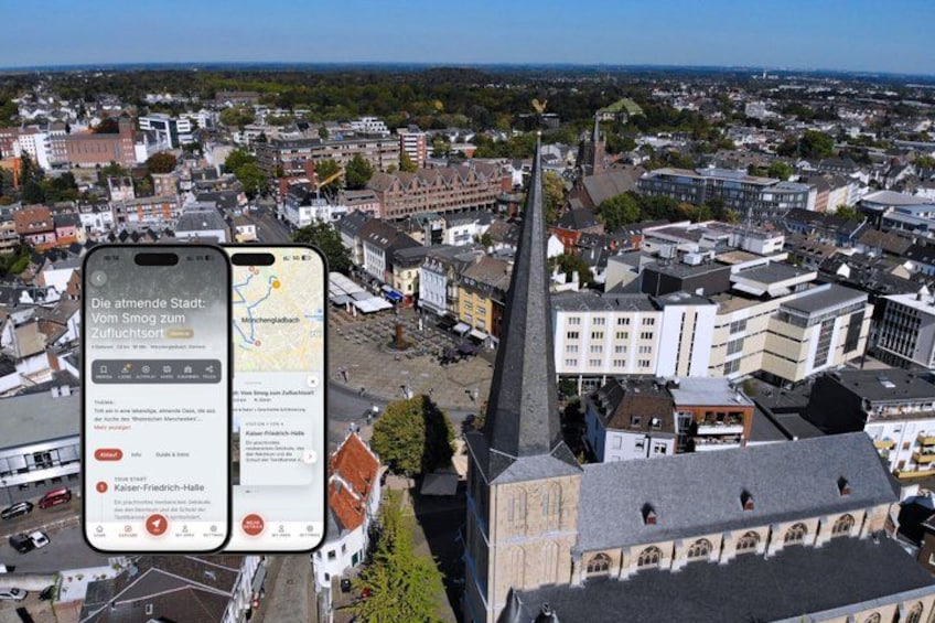 A smartphone displaying a map with a location marker, a church spire, and surrounding buildings. 1