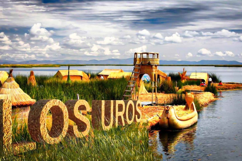 A thatched-roof village by a lake with a sign reading 'TOS UROS'. 4