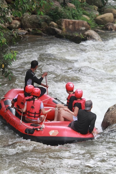 A group of people rafting on a river. 1