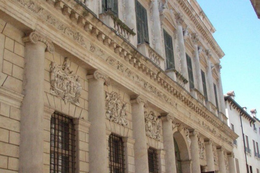 A classical building with ornate carvings and columns. 5