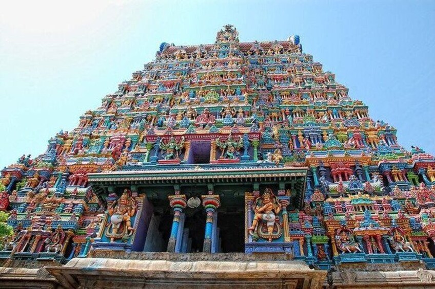A colorful temple with intricate carvings and statues. 2